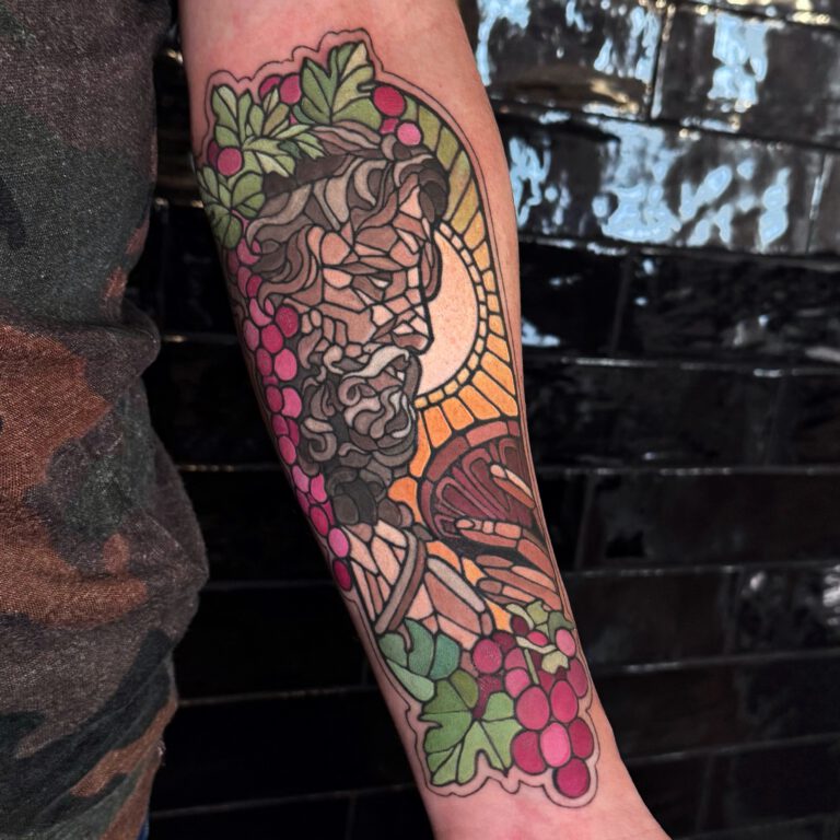 Bacchus god of wine in stained glass style tattoo