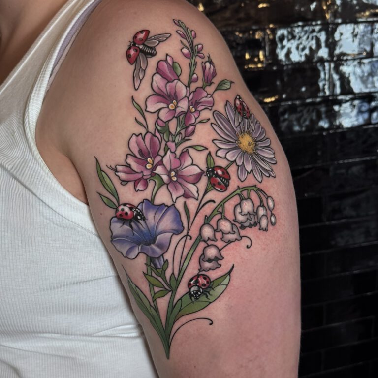 neotraditional flower tattoo with birth flowers and ladybugs by Marloes Lupker