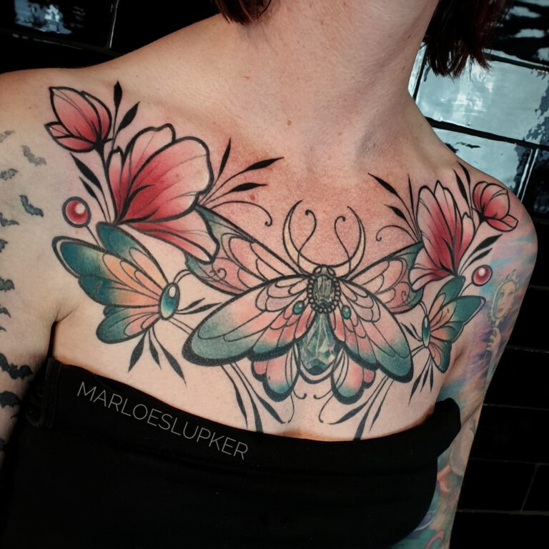 flower and moths neotraditional chest piece tattoo by Marloes Lupker
