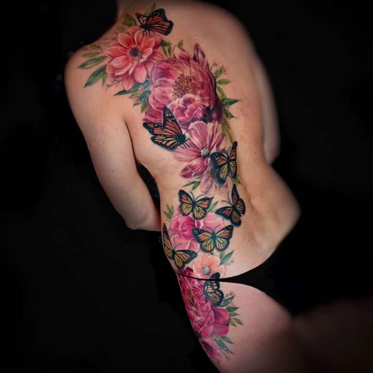 Peony roses and pink flower body tattoo with monarch butterflies in color realistic tattoo style by Marloes Lupker based in amsterdam the netherlands