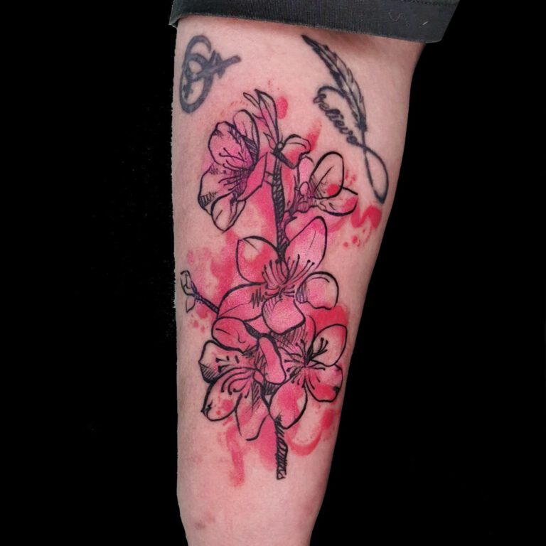Watercolor cherry blossom tattoo by Samalandra in Amsterdam