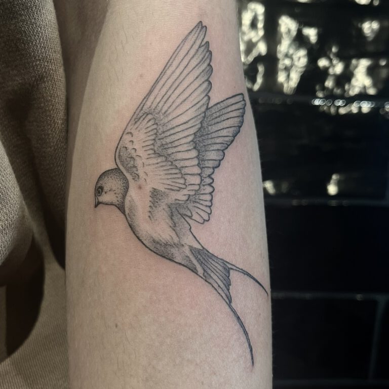 fineline swallow tattoo by cleo vlaming