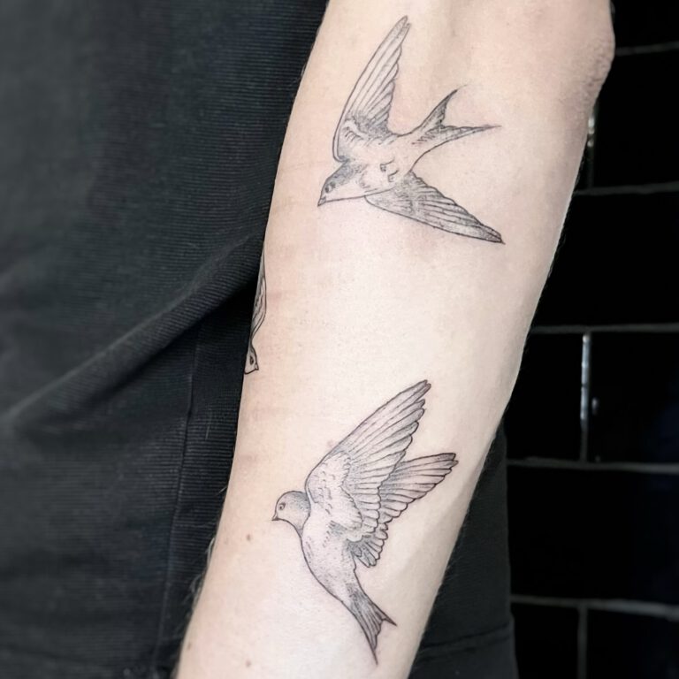 soft shading swallows tattoo by cleo vlaming
