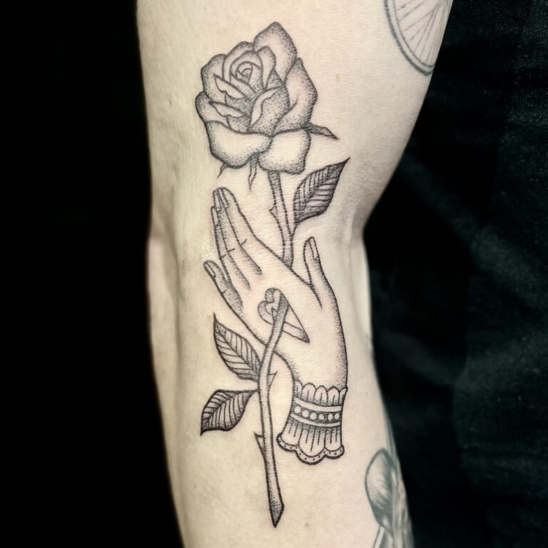 rose and hand tattoo by cleo vlaming