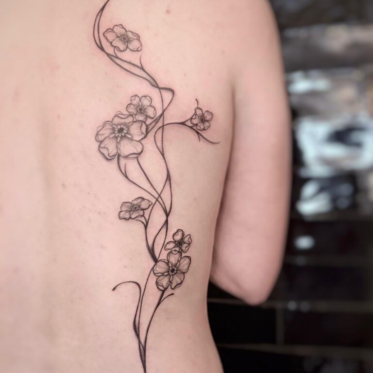 abstract floral backpiece tattoo by Cleo Vlaming