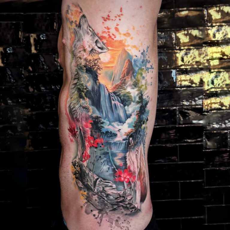 realistic color splash wolf landscape and waterfall tattoo by Marloes Lupker